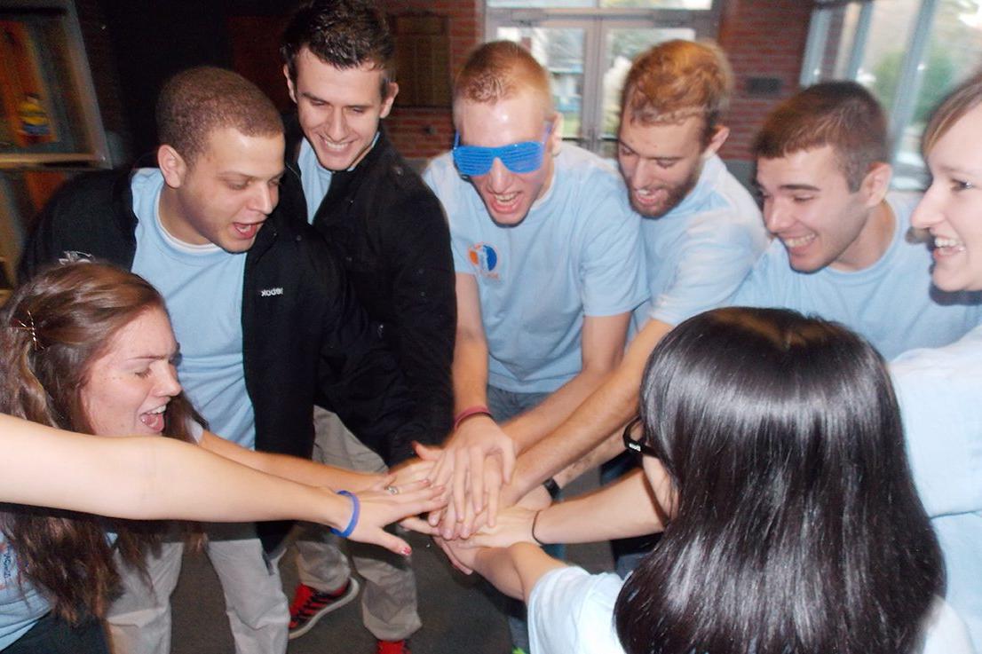 Keystone College students stack hands at Leadership Conference