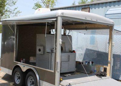 Trailer converted to a mobile glass studio